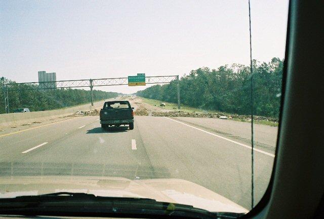 drive_30Aug01.jpg - Approaching Diamonhead on I-10E, considerable debris on the highway.