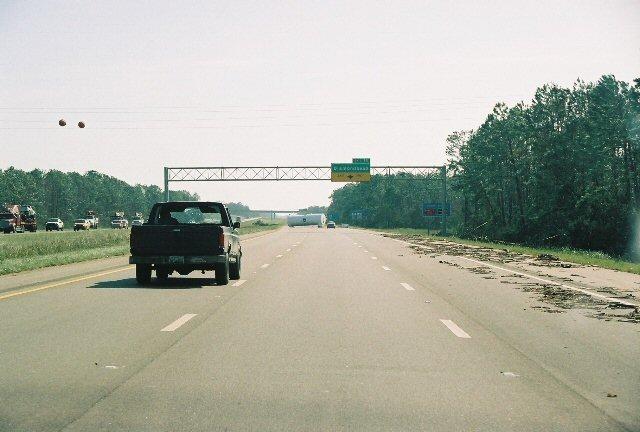 drive_30Aug02.jpg - A fuel tank from the Diamondhead airstrip ended up floating onto I-10.