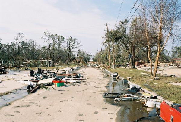 moms_house02.jpg - Brady drive near Hwy 90. The debris that you see here continued to get deeper and deeper as you walked up the street.