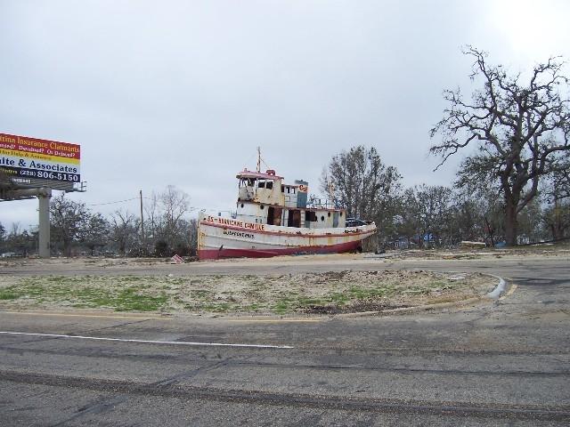 coast_post_katrina_052.JPG - Gulfport - Many buildings stood all around this location, gift shop was attached to the side of the boat.