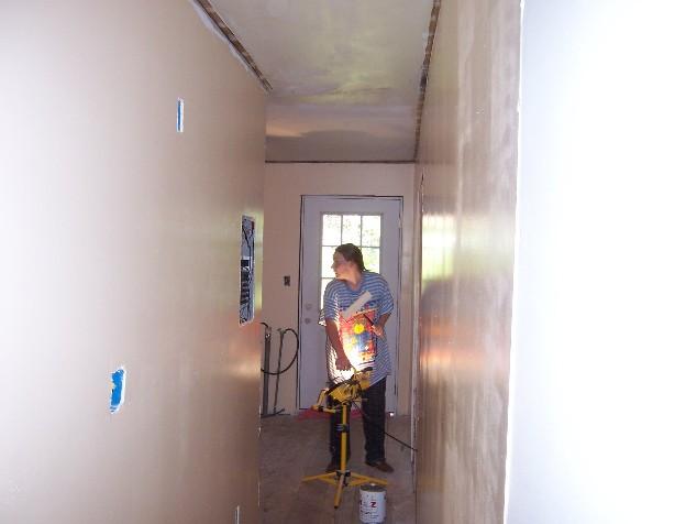 house122.JPG - Megan working in the laundry room