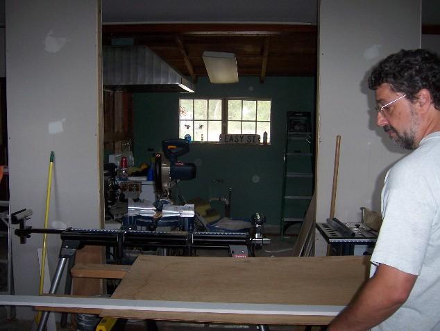 house80.JPG - The living room being the largest of the spaces became the staging room for all of the power tools for quite awhile